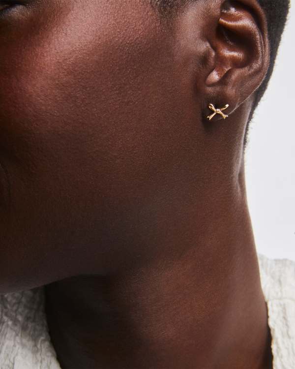 Tiny Bow Stud Earrings in 14k Yellow Gold - view 2